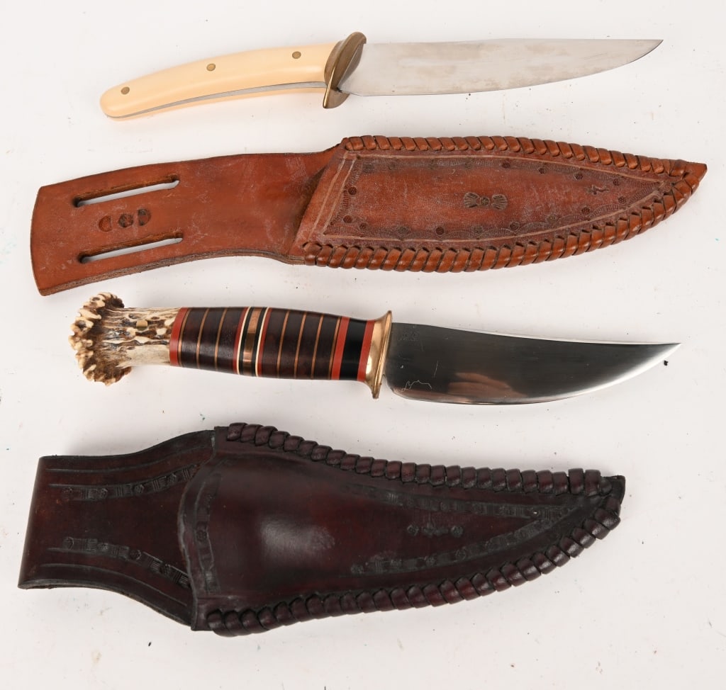 DOUGLAS NOREN SCAGEL STYLE CAMP KNIVES: This lot contains 2 great looking Scagel style camp knives. (1) Blade: 4 1/2". OAL: 6 1/8". This knife features a polished blade, stag handle with leather, fiber, copper spacers with a finely had craf