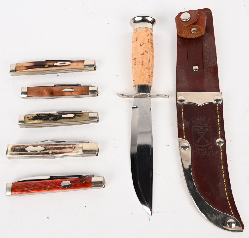 ASSORTED POCKET KNIVES AND FIXED BLADE: This lot contains: (1) Vintage Marbles M.S.A. Co. 01 Gladstone Mich 2 blade pocket knife. Blade: 3". OAL: 6 5/8". (1) Frank Buster Fight'n Rooster knife. Blade: 2 5/8". OAL: 6 1/8". (1) Schatt & Morga