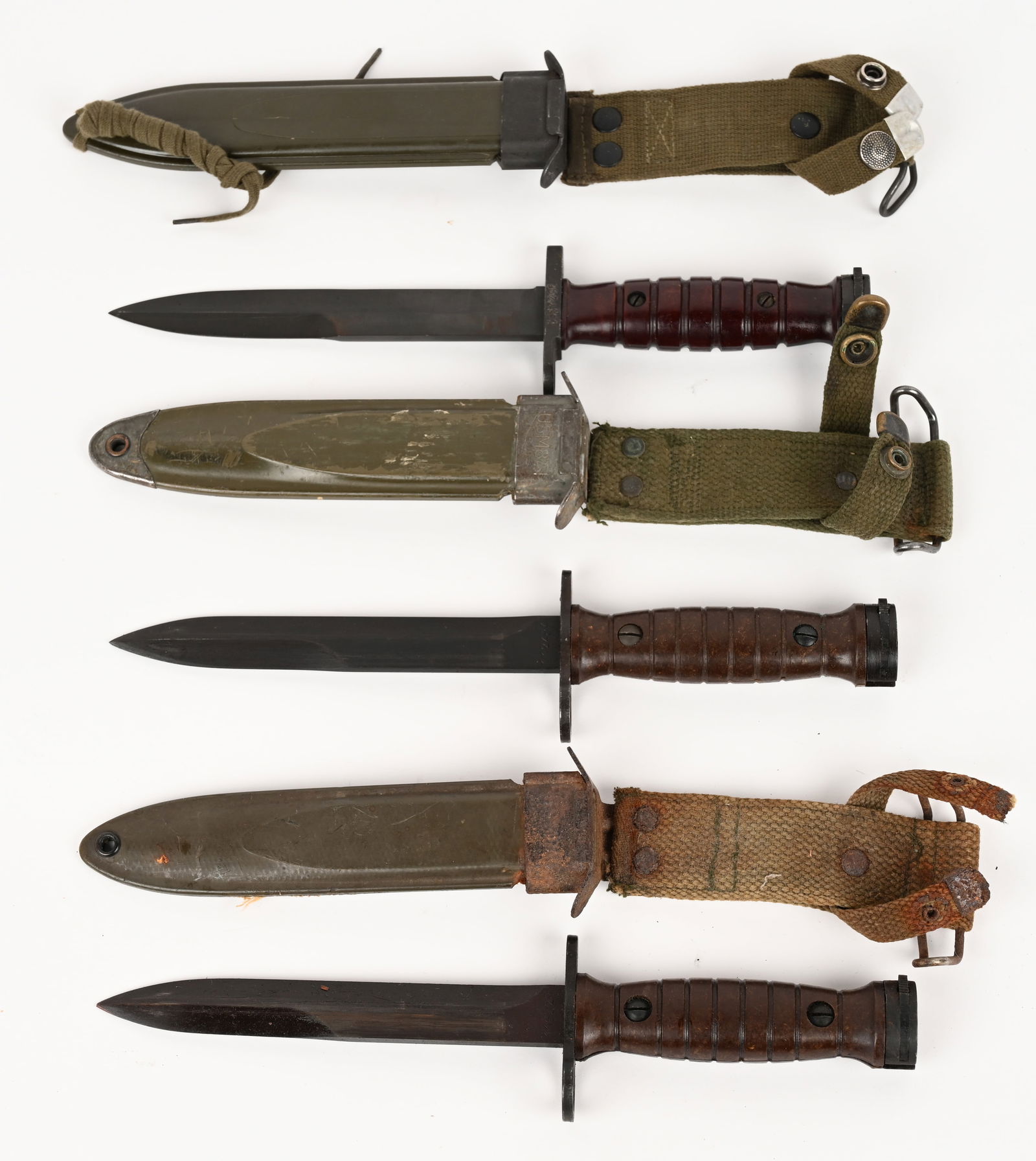 LOT OF THREE POSTWAR M1 CARBINE BAYONETS: This is a lot of 3 post war bayonets. CONDITION: Very Good.