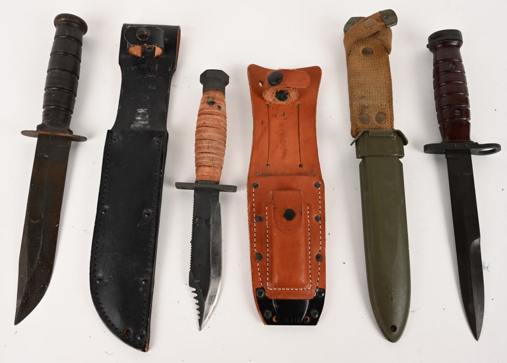 LOT OF THREE ASSORTED BAYONETS: This lot contains: (1) M1 Carbine bayonet (2) Combat / Fighting knives CONDITION: Very Good