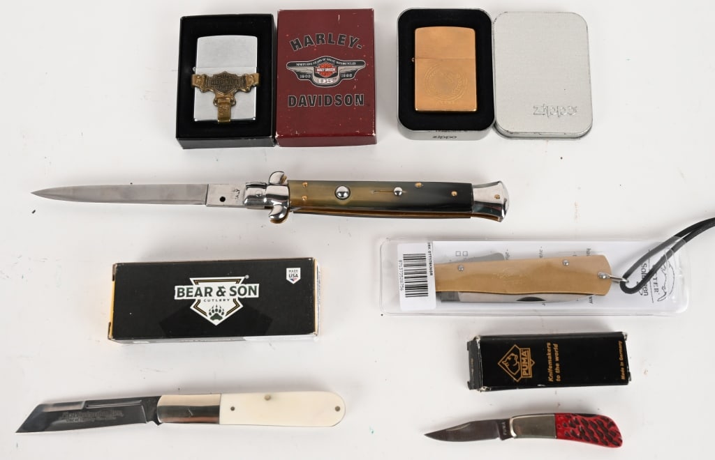 ZIPPO LIGHTER AND KNIFE ASSORTMENT: This lot contains: (1) Harley Davidson motorcycle belt ZIPPO lighter XIV (1) SEALED Caesars (Palace Casino) gold tone ZIPPO lighter (1) Italian Switch blade. Blade: 4 7/8". OAL: 10 7/8". (1) Soligen M