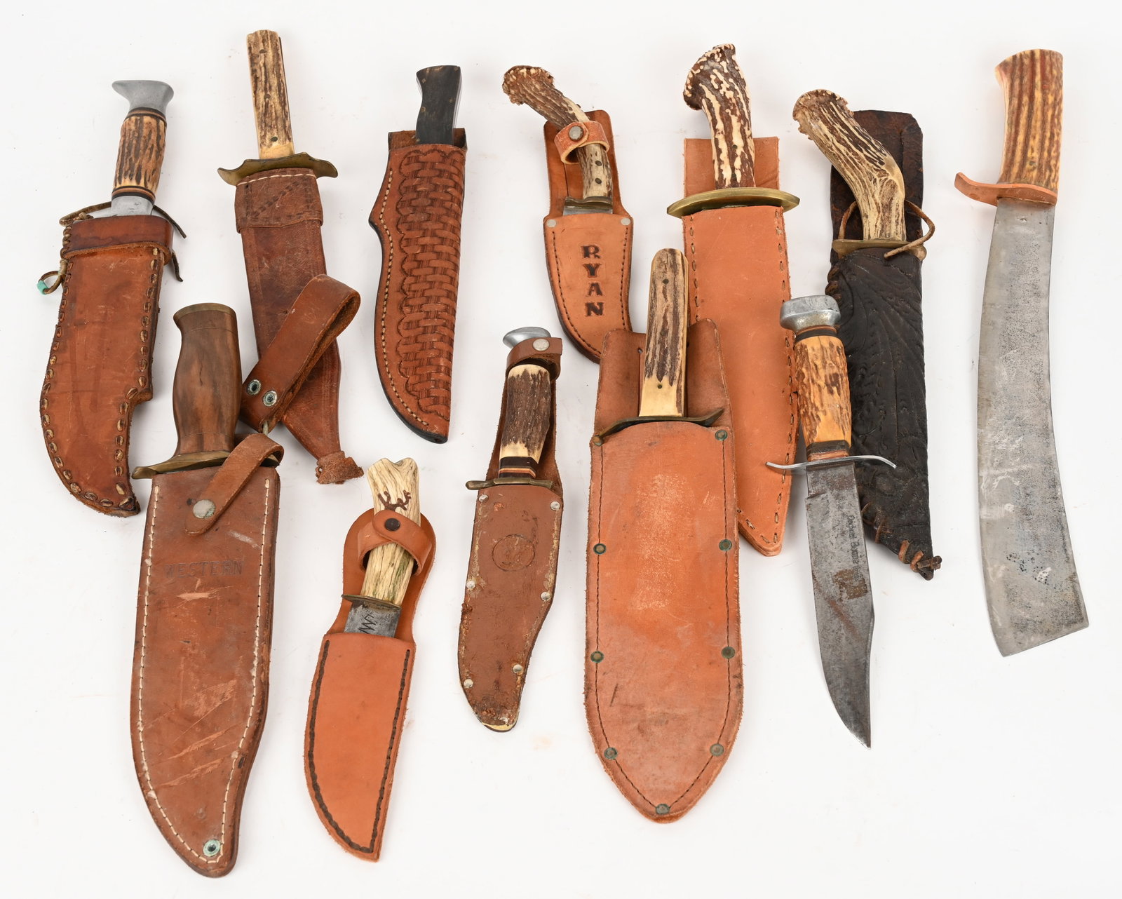 LOT OF BIG FIXED BLADE STAG HANDLE KNIVES: This sheathed lot of knives contains: (1) Mercator Solingen "Original Bowie Knife". Blade: 8". OAL: 13". (1) Custom Bowie marked "Gault". Blade: 9 1/4". OAL: 13 3/4". (1) Robert Klaas Bowie knife. Bla