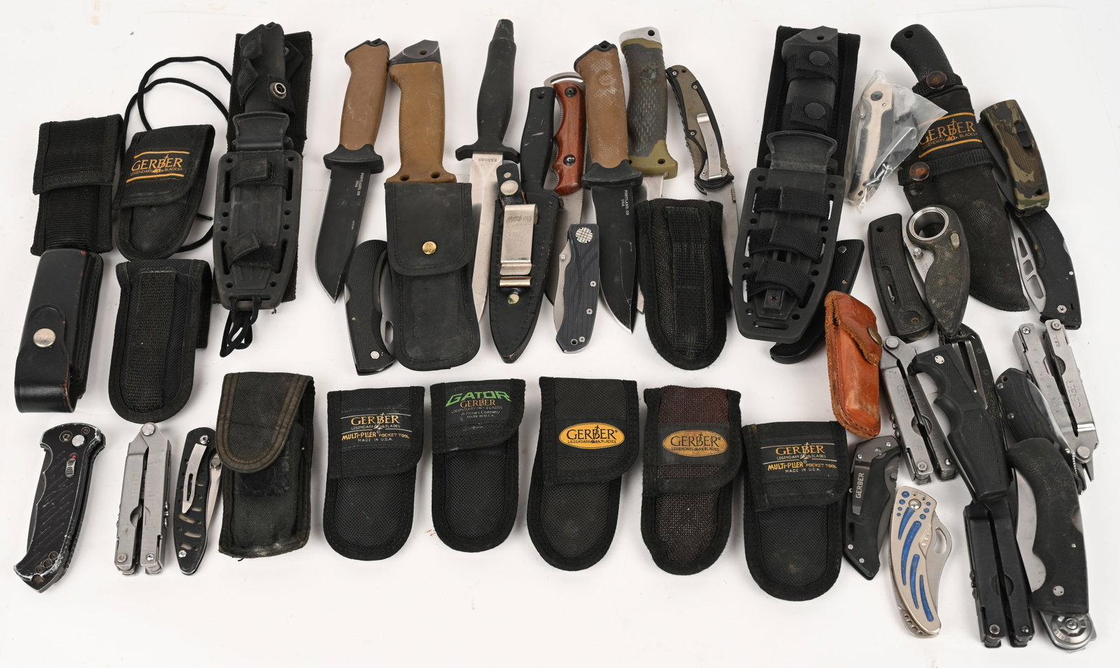 GERBER MULTI TOOLS AND BLADES: This is a lot of Gerber brand multi tools, fixed blade knives and folding knives from various manufacturers. (14) Gerber multitools (10) Gerber fixed Blade knives (20) folding knives from various manu