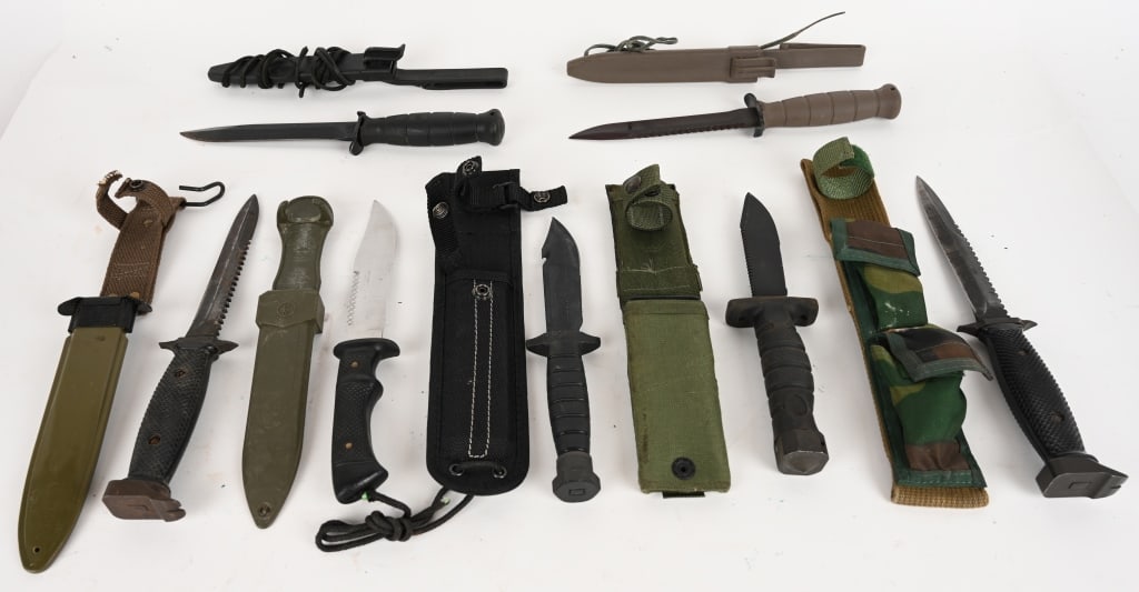 SEVEN SURVIVAL KNIVES WITH SHEATHS: This lot contains: (2) Glock 81 with polymer sheath. Made in Austria. Blade: 6 3/8". OAL: 11 3/8". (1) Ontario SP24 with black nylon sheath. Blade: 5". OAL: 9 5/8". (1) Imperial M7S with cammo nylon s