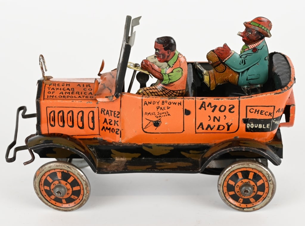 MARX TIN WINDUP AMOS & ANDY FRESH AIR TAXI: Marx tin windup Amos and Andy Fresh Air Taxi. All original and complete. Windup works. Nice clean example. 8" Excellent