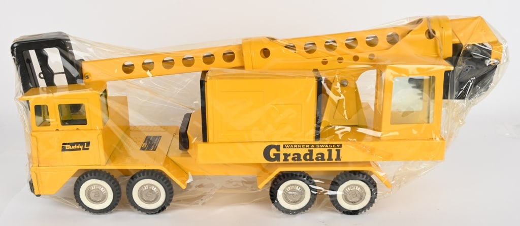 BUDDY L WARNER SWASEY GRADALL: Buddy L Warner Swasey Gradall. All original never played with. Still sealed in Store Package with Price Sticker. 24" Near Mint