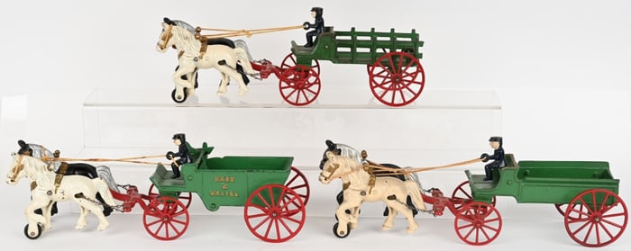 3- KENTON CAST IRON HORSE DRAWN WAGONS