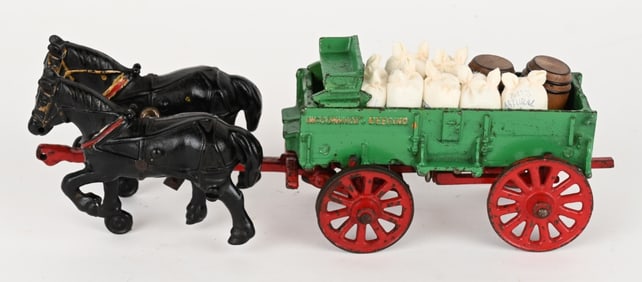 ARCADE CAST IRON McCORMICK DEERING WAGON