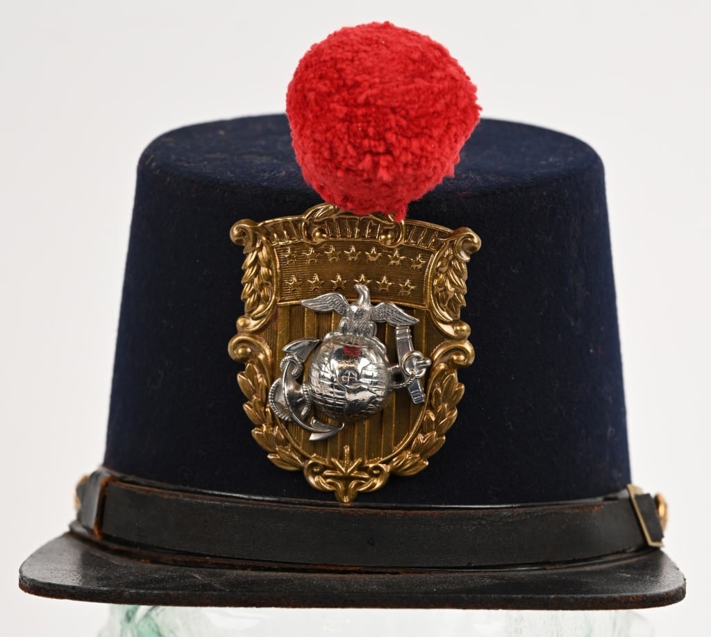 INDIAN WARS USMC 1875-1892 MARINE CORPS SHAKO: Attractive Rare USMC Original Pattern 1875-1892 Marine Corps Shako. Blue pressed felt body manufactured by Bent & Bush of Boston and is size marked 6 3/8 displaying a beautiful EGA Device to the front
