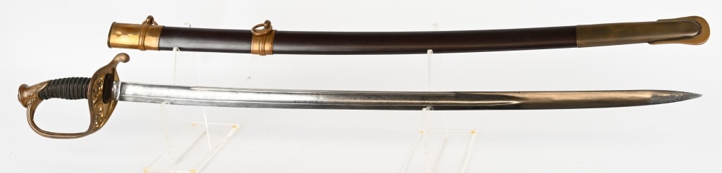 CIVIL WAR M1850 FOOT OFFICER'S SWORD BY COLLINS: Overall sword remains in fine + condition Civil War Foot Officer's Sword. Blade is fine with nice etching on both sides. The shark skin grip is very fine. The original blued steel brass mounted scabba