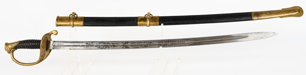 US MARINE CORPS M1875 NON COMMISION OFFICERS SWORD: U.S. Marine Corps Model 1875 NCO sword by WKC and imported by W.H. Horstmann & Sons. Slightly curved 28 1/2 inch fullered blade with 16 inch panel etched with scrolling florals and panoplies, one side