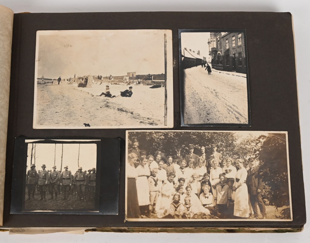 WW1 IMPERIAL GERMAN REGIMENT PHOTO ALBUM WWI: WWI Imperial German Photo Album containing roughly 100 photos of group shots and portraits of German soldiers. There are several loose photos with inscriptions to the reverse. Excellent.