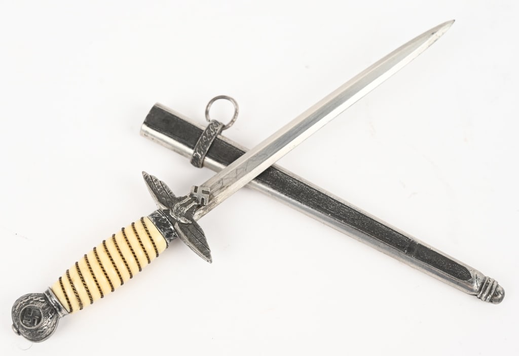 WWII NAZI GERMAN LUFTWAFFE MINIATURE DAGGER WW2: This example of a 2nd model Luftwaffe dagger measures 6 inches overall. The pommel and crossguard are extremely well done being identical to the large counterpart. The grip is also a fine example bein