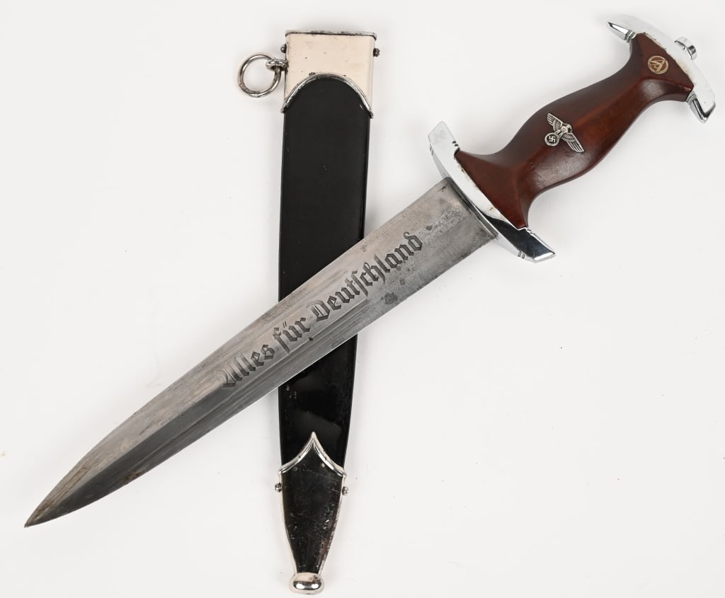 WWII NAZI GERMAN EARLY NSKK DAGGER BY EPPENSTEIN: Nice quality dagger features a roughly, 8 3/4", (22.2 cm), long double edged nickel/silver plated drop forged steel construction blade with a low central ridge but has been slightly tipped, including