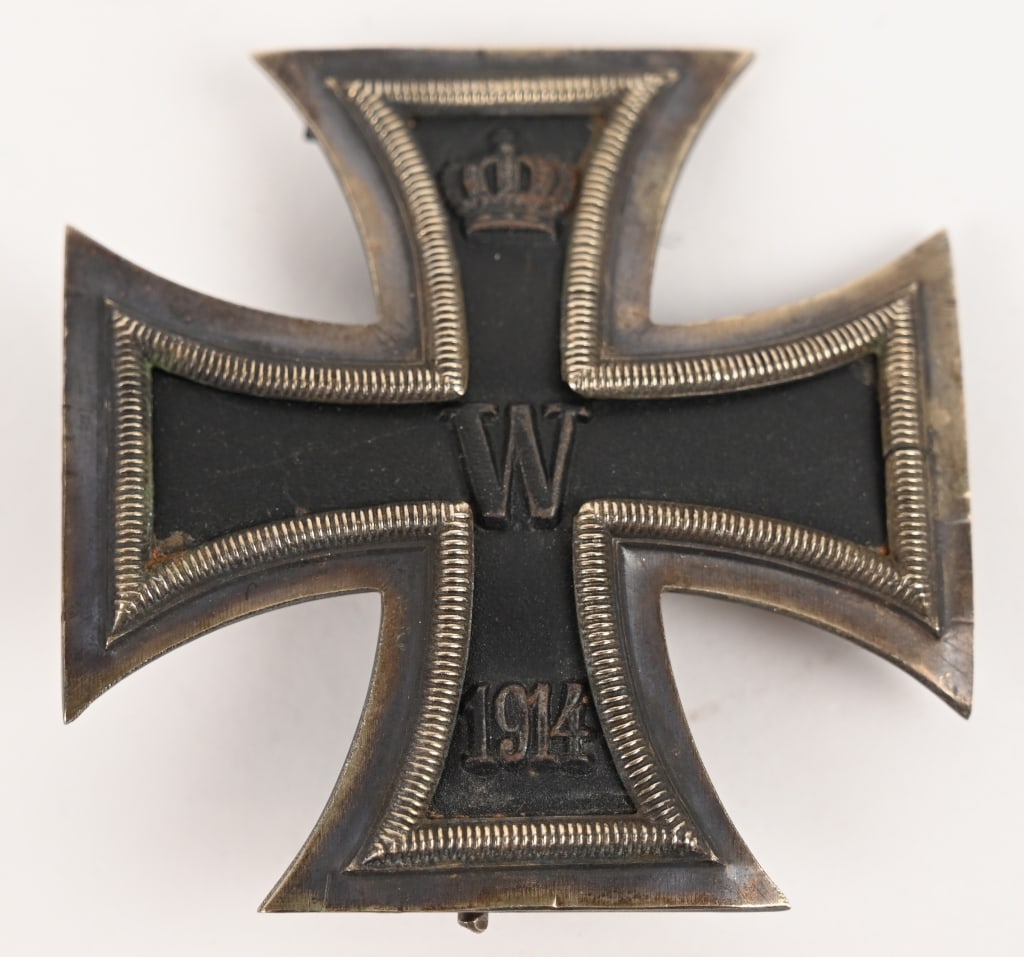 WW1 IMPERIAL GERMAN IRON CROSS 1ST CLASS EK1 WWI: Imperial German WWI 1st Class 1914 Iron Cross Decoration. Measures 1 3/4" wide by 1 3/4" tall. The front of the maltese cross shows a King's crown at the top of the upper arm with a 'W' in the center.