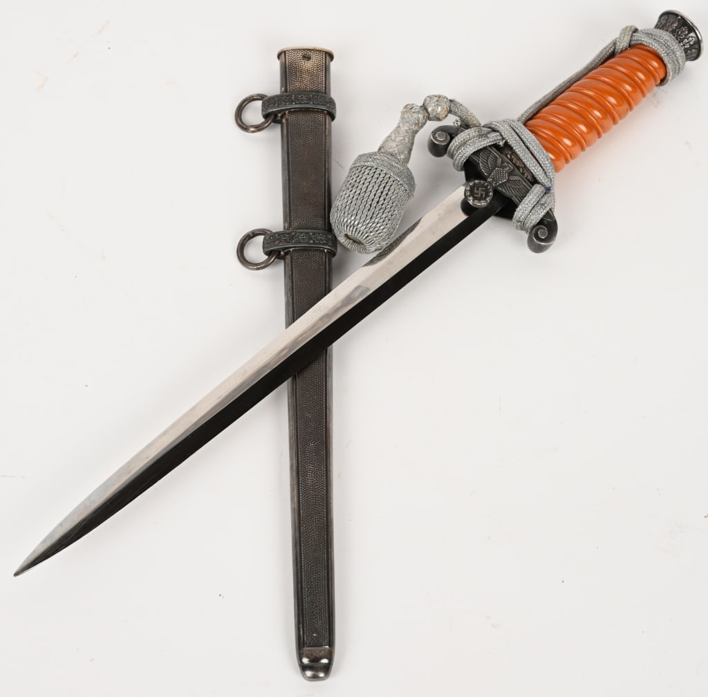 WWII NAZI GERMAN ARMY OFFICERS DAGGER WW2: The dagger features a roughly 26cm long drop forged steel construction nickel/silver plated stiletto style blade with a flat central ridge and a full length including the hilt of roughly 38cm. MINT bl