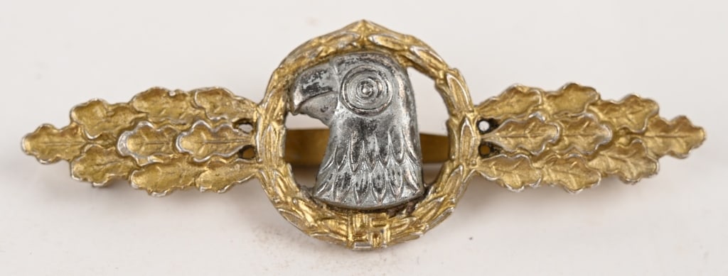 WWII NAZI GERMAN LUFTWAFFE RECONNAISSANCE CLASP: Luftwaffe reconnaissance clasp in gold by JMME & Sohn, Berlin. Tombac constructed clasp with riveted eagle device. Excellent condition with normal signs of age and nice overall patina. Tombac rivets i