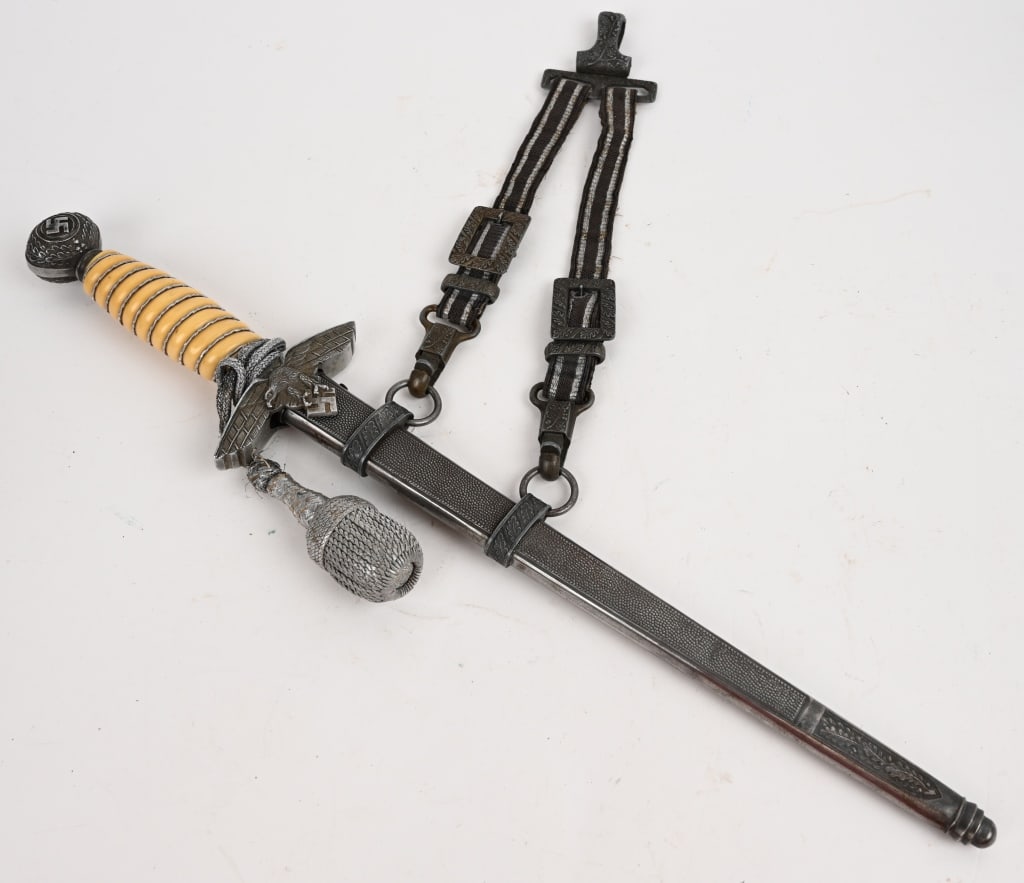 WWII NAZI GERMAN LUFTWAFFE OFFICERS DAGGER WW2: Roughly 29cm long, bright, nickel/silver plated, double edged, drop forged steel, stiletto style blade with a flat central plane that shows that it has been dropped. Maker marked to WKC. The leather w