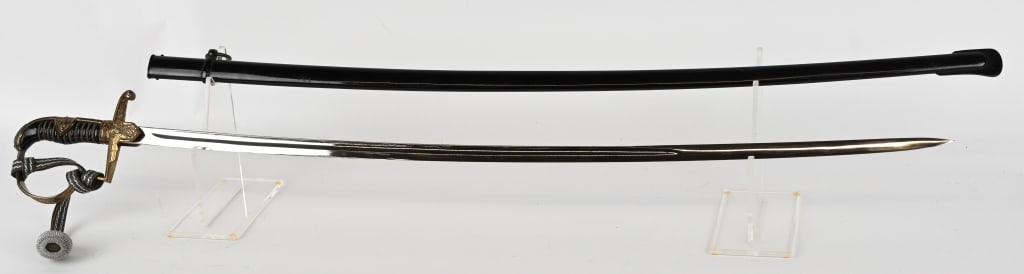 NAZI ARMY OFFICER'S EICKHORN PRINZ EUGEN SWORD: Eickhorn Prinz Eugen Field Marshall Model 1765 Officer’s saber. The Prinz Eugen is one of the few swords with two German eagles and swastikas in the design. Nice Eickhorn logo. Brass hilt fittin