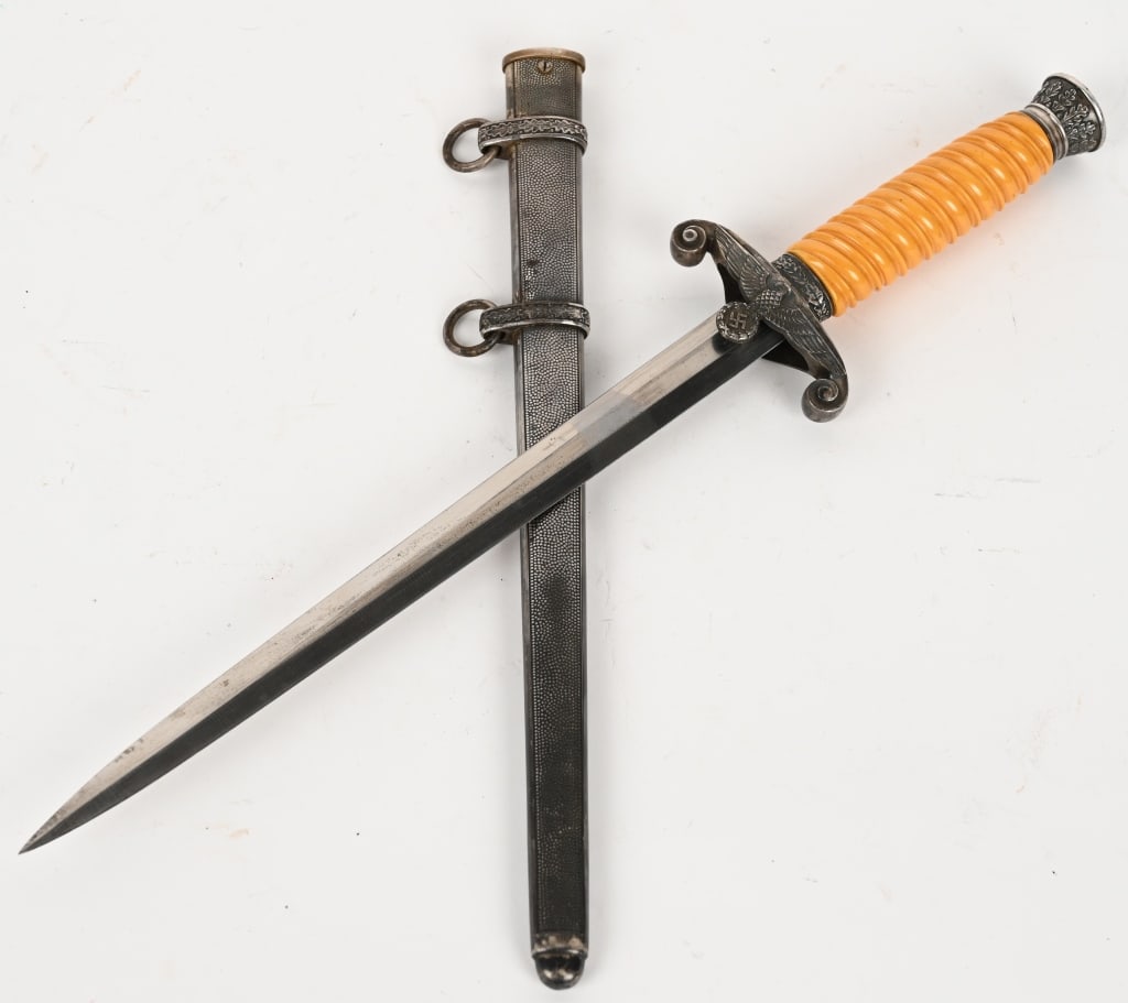 WWII NAZI GERMAN ARMY DAGGER BY EICKHORN WW2: The dagger features a roughly 26cm long drop forged steel construction nickel/silver plated stiletto style blade with a flat central ridge and a full length including the hilt of roughly 38cm. Maker m