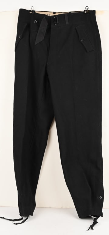 WWII NAZI GERMAN LUFTWAFFE BLACK PANZER TROUSERS: German WWII Panzer troops unissued trousers. These are excellent condition. Coarse black wool, later model issue and size stamped and maker marked inside the liner. Front slash pocket flaps, the botto