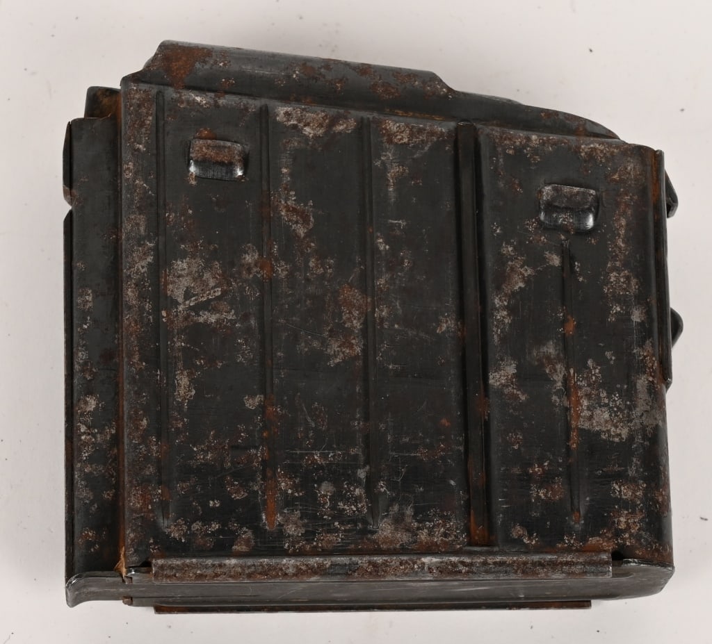 WWII NAZI GERMAN GEWEHR G 43 MAGAZINE ACW CODE: German WWII era G-43 magazine for 8mm Gewehr 43 rifle. Maker mark "acw" and "WaA588 K43" to the right of the maker's mark. 3-3/4" x 3-1/2" x 1". Has some minor wear and spring functions well and the m
