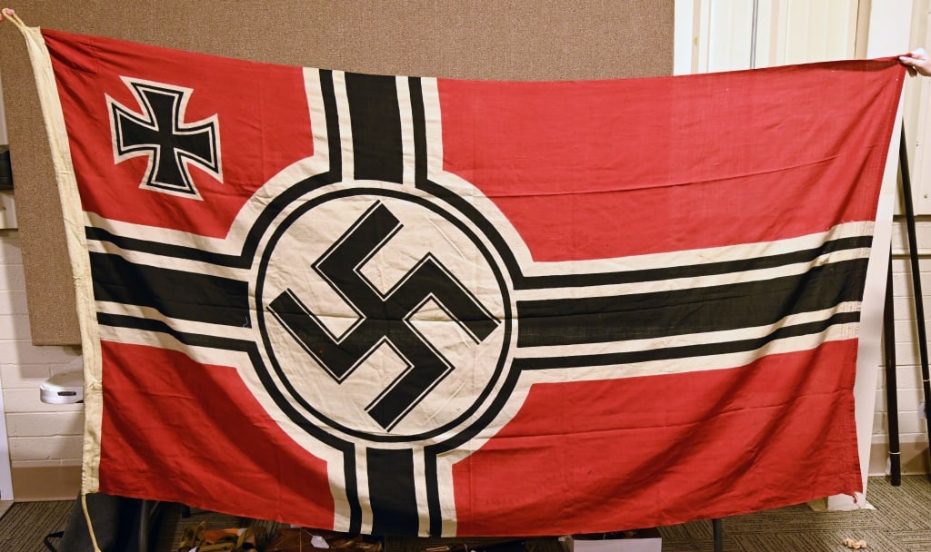 WWII NAZI GERMAN KRIEGSMARINE FLAG 1.5X2.5 EAGLE M: Second pattern, (Circa 1937/38-1945), single piece, dual sided, printed wool construction national war flag. The flag features a red base field with a central white/black/white/black bordered white di