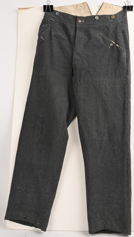 WWII NAZI GERMAN M36 STRAIGHT LEG TROUSERS UNIT MD: A scarce pair of German M36 straight leg trousers in the stone grey colour seen worn by the German army in the very early war period. These show several period repairs and are unit marked to the inter