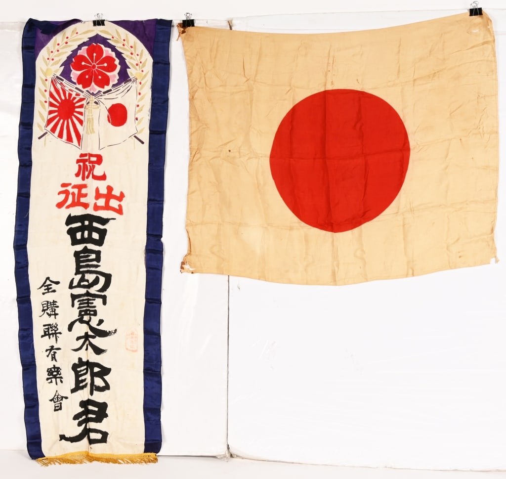 WWII JAPANESE PATRIOTIC BANNER W RISING SUN LOT: Large silk Japanese Patriotic banner or flag measuring 17" by 56" with both National and Rising Sun Flags. Also in the lot is a silk Imperial Japanese National flag measuring 28 X 34 inches with origi