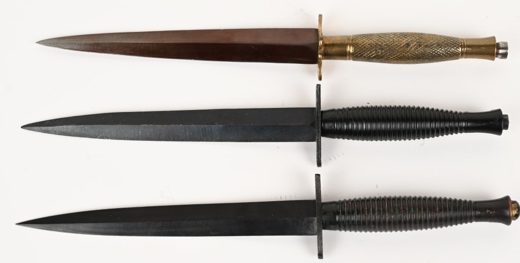 BRITISH FAIRBAIRN SYKES FIGHTING KNIFE LOT OF 3: Lot of 3, British Fairbairn Sykes Fighting Knives measuring 11 3/8 inches overall with a stiletto blade that measures 6 1/2 inches. Zinc cast brass grips are excellent. The brass grip dagger is marked