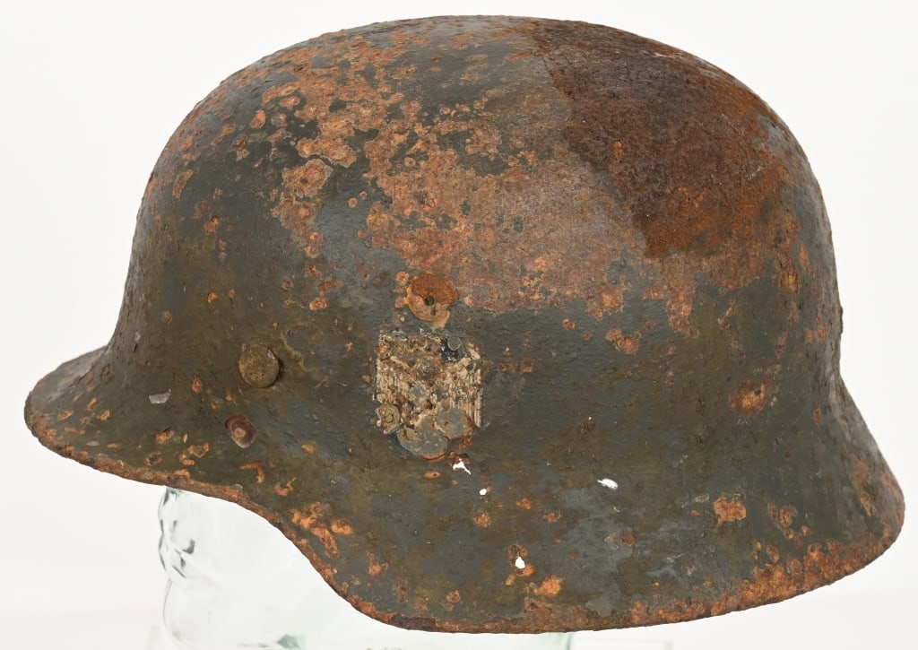WWII NAZI GERMAN M35 DD COMBAT HELMET DUG WW2: Dug WWII Nazi German M35 Double Decal Combat Helmet Both decals are present but obviously shows significant wear. 