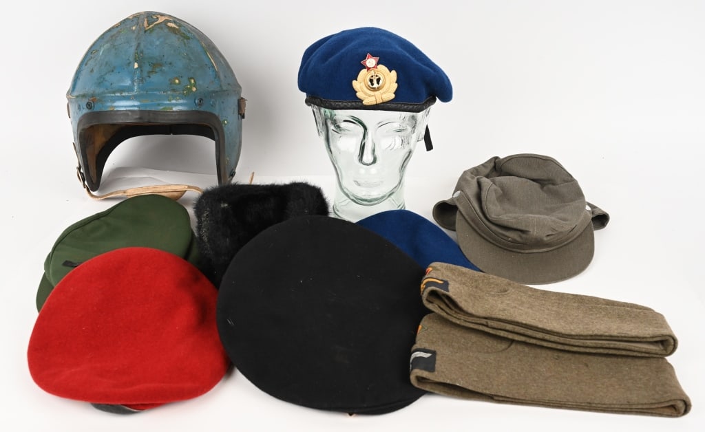 LOT OF MILITARY HEADGEAR H-4 FLIGHT HELMET GERMAN: A lot of military headgear to include 1) US Navy 1950s H-4 Flight Helmet size Large and has been period painted blue. 2) Soviet Union Navy Black Beret size marked 59 3) Soviet Winter Cap 4) Soviet Uni