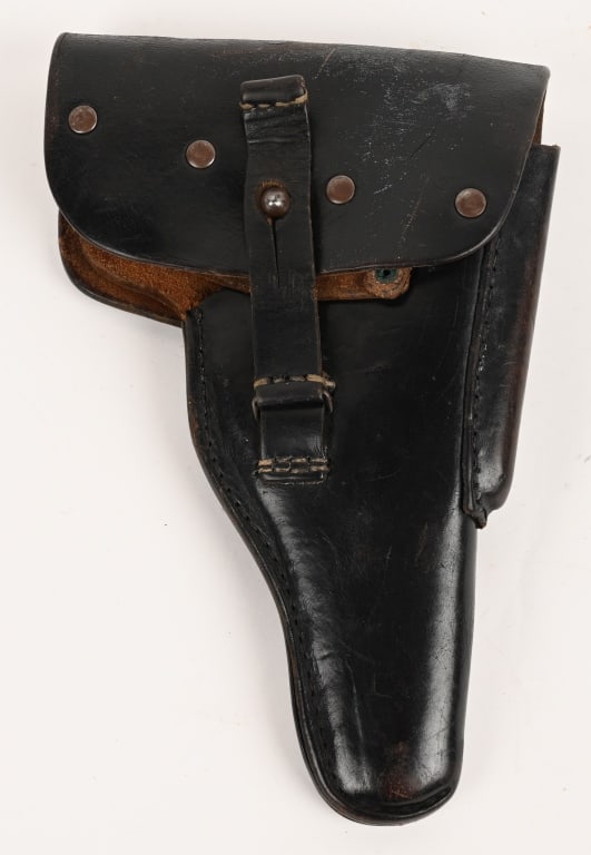 POST WWII NAZI GERMAN P38 LEATHER HOLSTER UNIT MKD: Post War P-38 Leather Holster in excellent condition Unit marked to the interior. Leather is still very supple. Excellent.