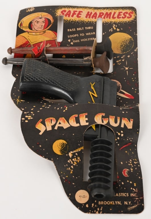 PALMER SPACE GUN MOC: Palmer Space Gun. New Old Stock on Card with Darts. Great space graphics on the Card. 10" Excellent