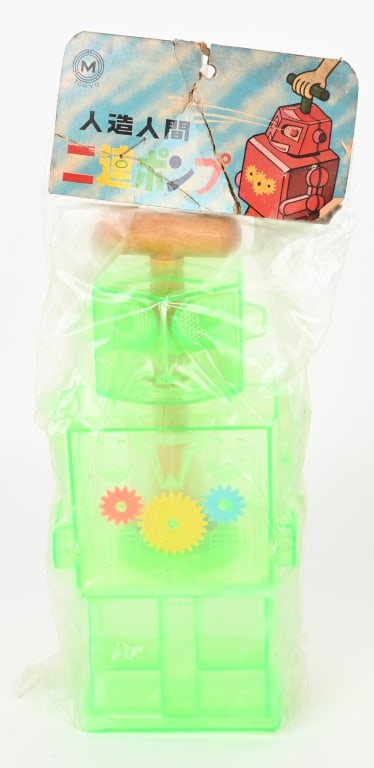 JAPAN PLASTIC WATER ROBOT MIP: Japan Plastic Water Robot. New Old Stock sealed in Package with Header Card. Shoots water of its eyes. 9 1/2" Excellent