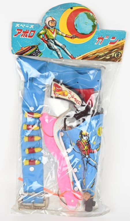 JAPAN SPACE GUN HOLSTER SET MIP: Japan Space Gun & Holster Set. Great graphics. New Old Stock sealed in package with header card. 14" Excellent