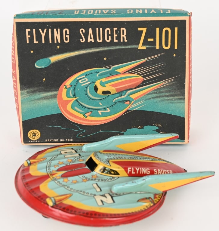 JAPAN TIN FRICTION FLYING SAUCER Z-101 w/ BOX: Japan tin friction Flying Saucer Z-101. All original with great colors. Clean condition. Friction works. With beautiful colorful Box. 7" Excellent