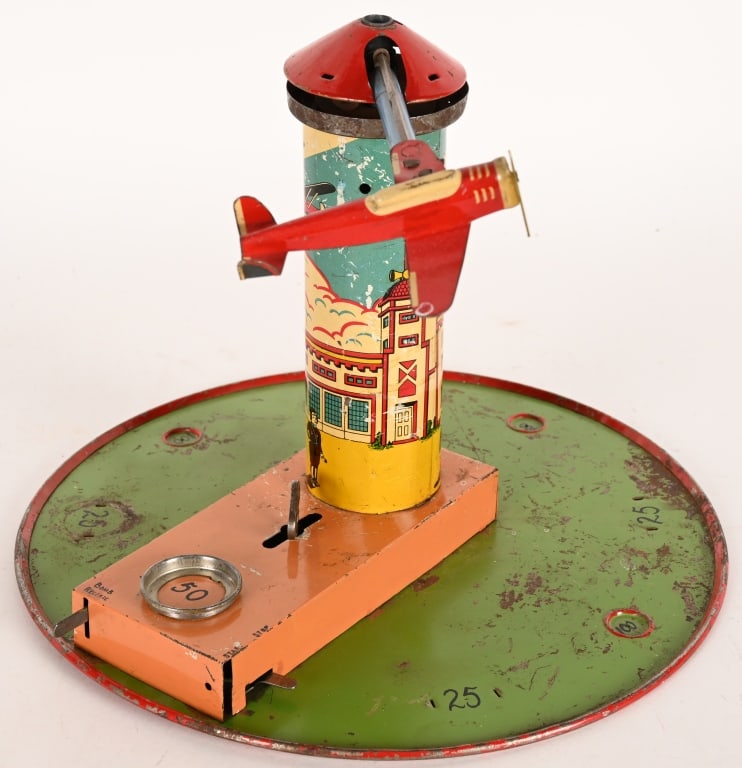 MARX PROTOTYPE 1941 TIN WINDUP AIRPLANE BOMBER: Rare 1941 Marx Prototype tin windup Airplane Bomber that was purchased at one of the Marx Toy Hoard Auctions. The toy is handpainted and litho tin. The windup works but does not revolve the airplane.