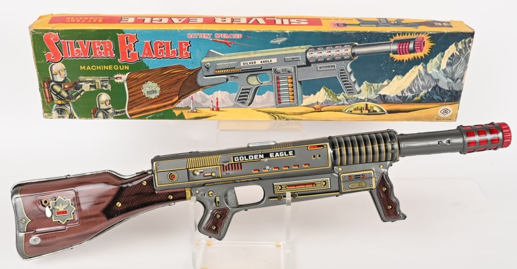 JAPAN BATTERY OP GOLDEN EAGLE SPACE GUN w/ BOX: Japan battery operated Golden Eagle Space Gun. All original in great shape. In Box with great Space graphics. 24" Excellent
