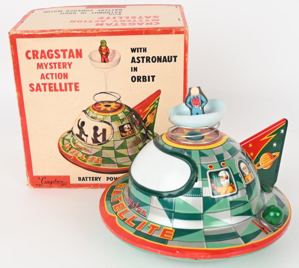 CRAGSTAN BATTERY OP MYSTERY ACTION SATELLITE: Japan battery operated Cragstan Mystery Action Satellite. All original in great condition. Still has floating Astronaut. Worked when tested. Boxed 8" Excellent