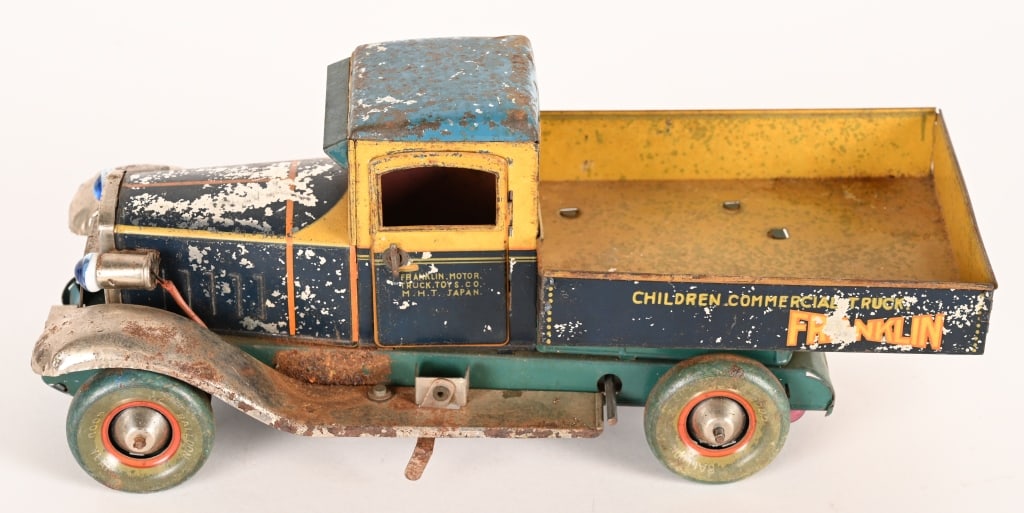 JAPAN PRE-WAR FRANKLIN WINDUP TRUCK: Pre-War Japan windup Franklin Truck. Has electric headlights. All original condition. Marked on truck "Children Commercial Truck Franklin". Windup works. Has some typical wear. And battery oxidation