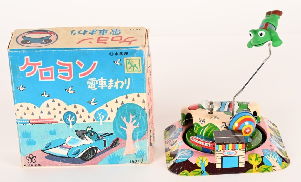 YONE TIN WINDUP KEROYON GO ROUND w/ BOX: Japan tin windup Keroyon Go Round. All original with great graphics. has Keroyon figure that flies around. Works. Boxed 5 1/2" Excellent