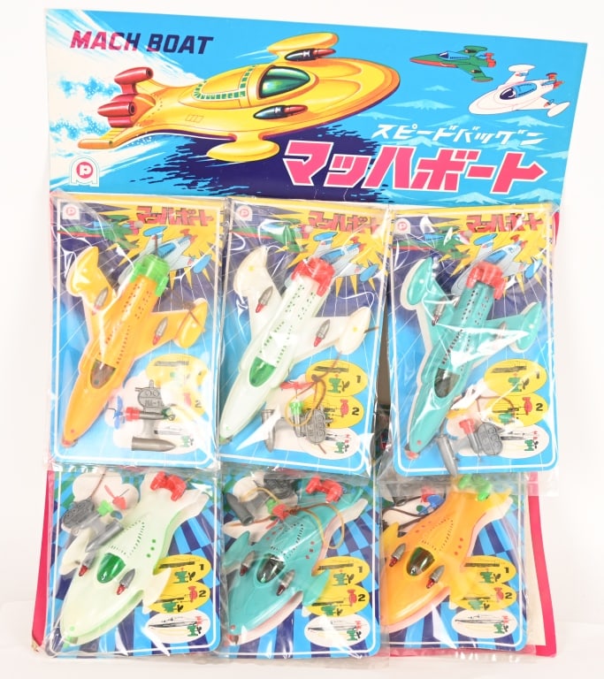 6- JAPAN MACH BOAT SPACESHIPS w/ DISPLAY: Full Store Display card of 6 Mach Boat Spaceships. All New Old Stock in packages. made in Japan. Each Spaceship measures 6". Display measures 21" Excellent