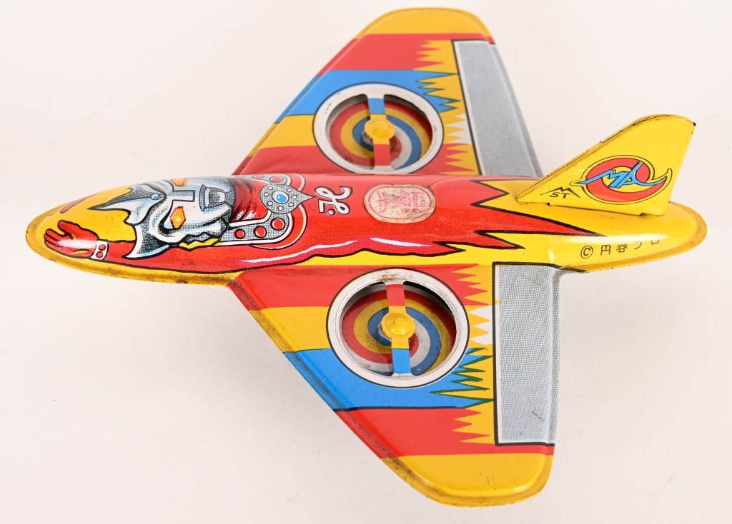 ST TIN FRICTION ULTRAMAN ACE AIRPLANE: Japan tin friction Ultraman Ace Airplane. Nice colors. All original with great graphics. Friction works. 6" Excellent