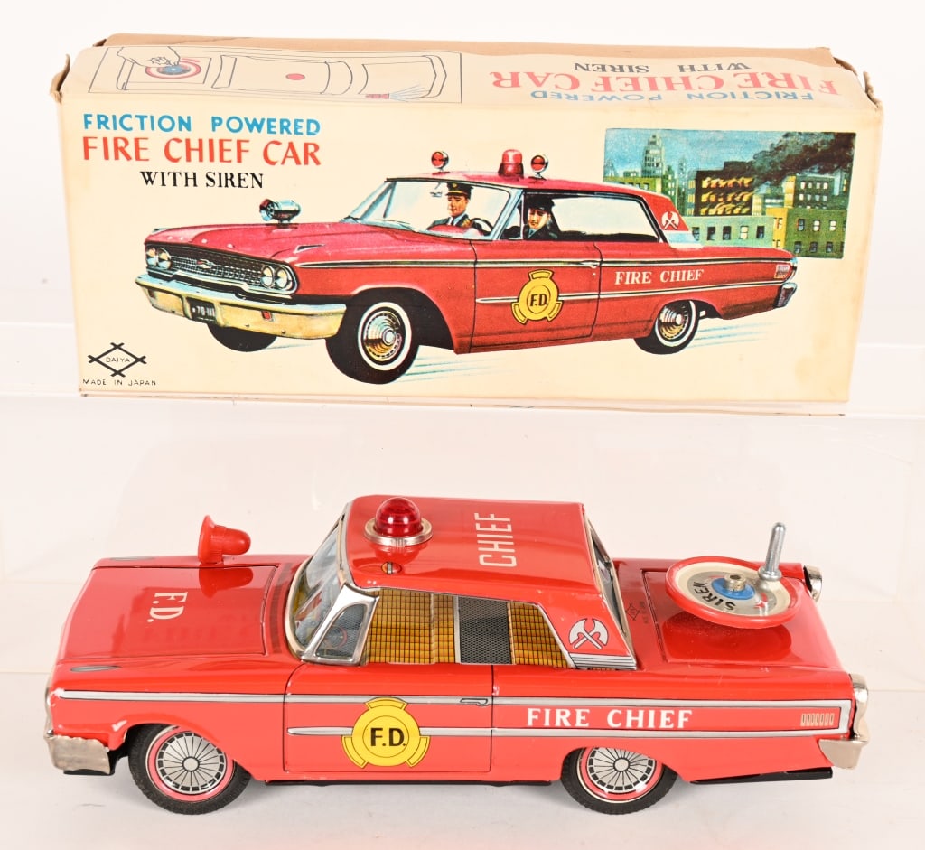 DAIYA FRICTION CHEVY IMPALA FIRE CHIEF CAR w/BOX: Japan tin friction Chevy Impala Fire Chief Car. Has siren on truck of car. All original and never played with condition. Friction and Siren work. Boxed with Insert. 9" Excellent
