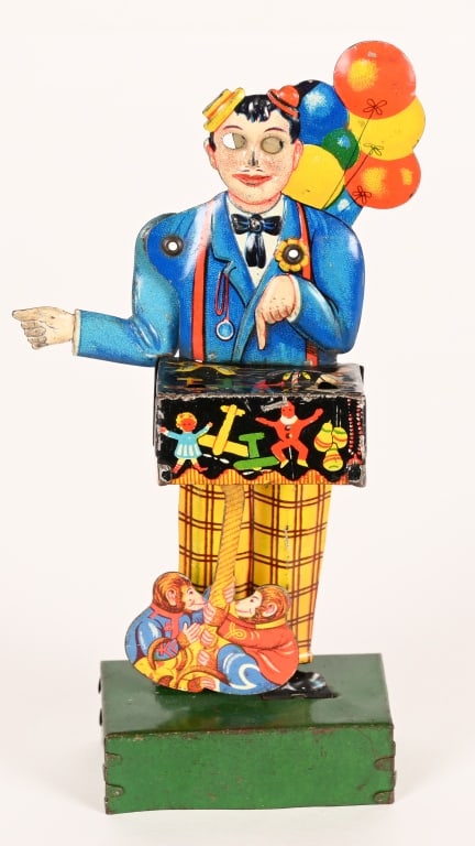 GERMAN TIN WINDUP BALLOON VENDOR (1 of 2)
