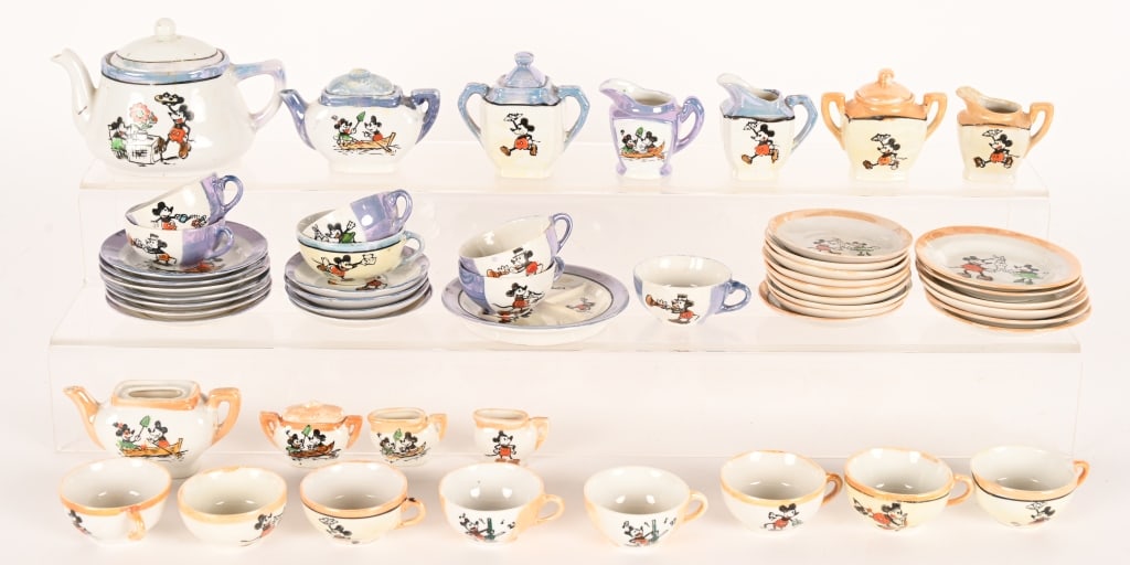 2- JAPAN BISQUE MICKEY MOUSE TEA SETS: Pair of Japan bisque Mickey Mouse Tea Sets. Both mostly complete. A few piece may have chips. AS-IS