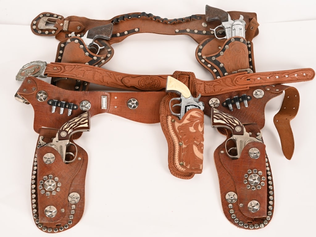 3- CAP GUN & HOLSTER SETS: Includes Roy Rogers Gun Set with Holster, Marshall Gun Set with Holster, and Eagle Gun with Holster. All in decent condition. AS-IS