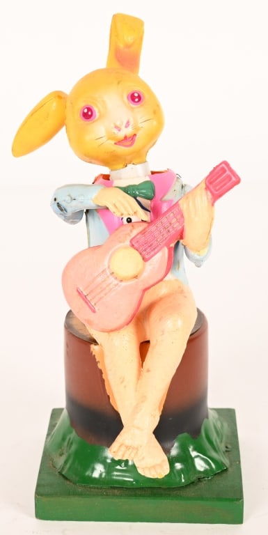 OCCULIED JAPAN CELLULOID WINDUP RABBIT w/ GUITAR: Occupied Japan celluloid windup Rabbit Playing Guitar. All original and works. 7 1/2" Excellent