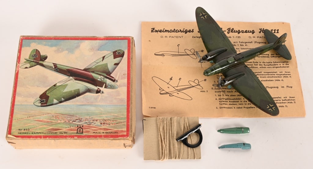LEHMANN #833 HEINKEL GERMAN AIRPLANE w/ BOX: Lehmann #833 Heinkel-kampfflugeug German Military Airplane. All original in great condition. Comes with all accessories and instructions. Boxed 6" Excellent